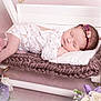 baby, sleeping, infant, lace_outfit, headband, flower, flowers, swing, knitted_cushion, white_wood, pink_background, cute, peaceful, portrait, newborn, soft_texture, resting, decor, indoor, child
