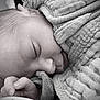 Isaac participe au concours pour gagner de l'argent avec cette photo : newborn, baby, sleeping, infant, blanket, swaddle, face, hand, closeup, portrait, black_and_white, monochrome, skin, peaceful, cozy, soft_texture, knit, nursery, tiny, cute