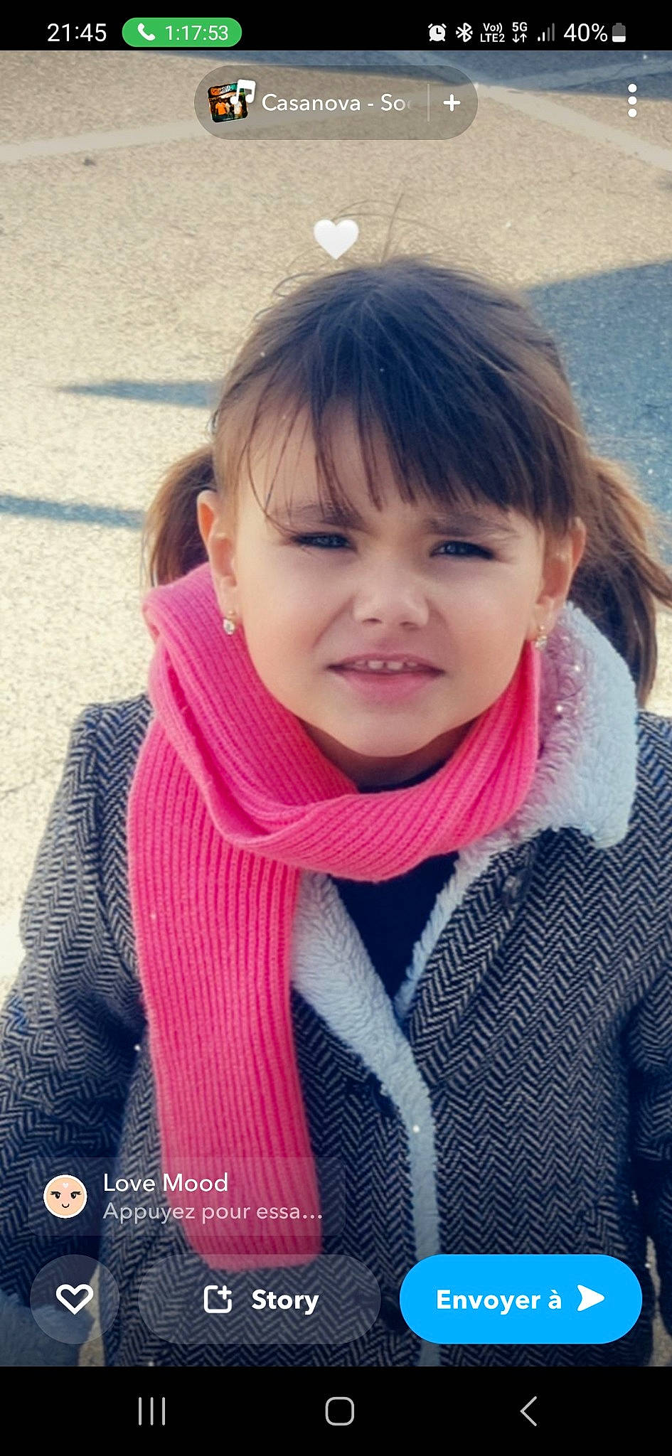 Romy participe au concours pour gagner de l'argent avec cette photo : black_hair, cheek, child, cool, eyebrow, eyelash, fashion_accessory, fun, happy, lip, neck, nose, pattern, person, scarf, shawl, skin, sleeve, stole, toddler