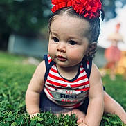 Emmarie Grace joined the competition — help win amazing prizes! baby, blurred_background, child, crawling, curious, cute, eyes, face, grass, hand, infant, nature, outdoor, patriotic, portrait, red_bows, skin, striped_clothing, summer, tank_top