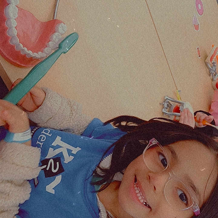 Maylin joined the competition — help win amazing prizes! accessories, baby, bodypart, brush, cutlery, device, face, finger, hand, head, jewelry, mouth, necklace, person, photography, portrait, spoon, teeth, tool, toothbrush