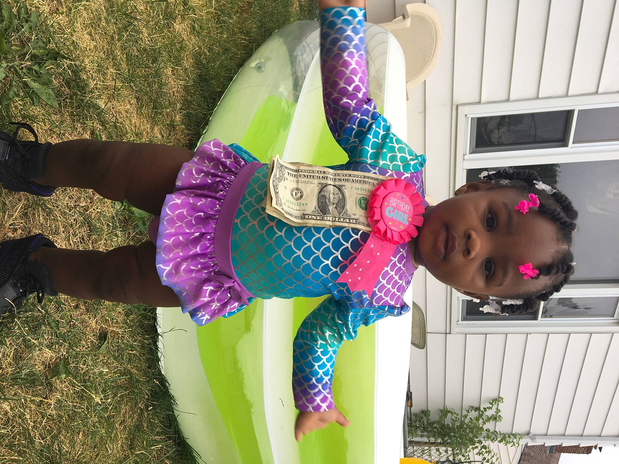 Jayvonna is registered to the contest to win money with this photo: door, fun, grass, happy, headgear, human_leg, joint, leggings, leisure, magenta, pattern, person, pink, plant, purple, textile, thigh, toddler, vertebrate, waist