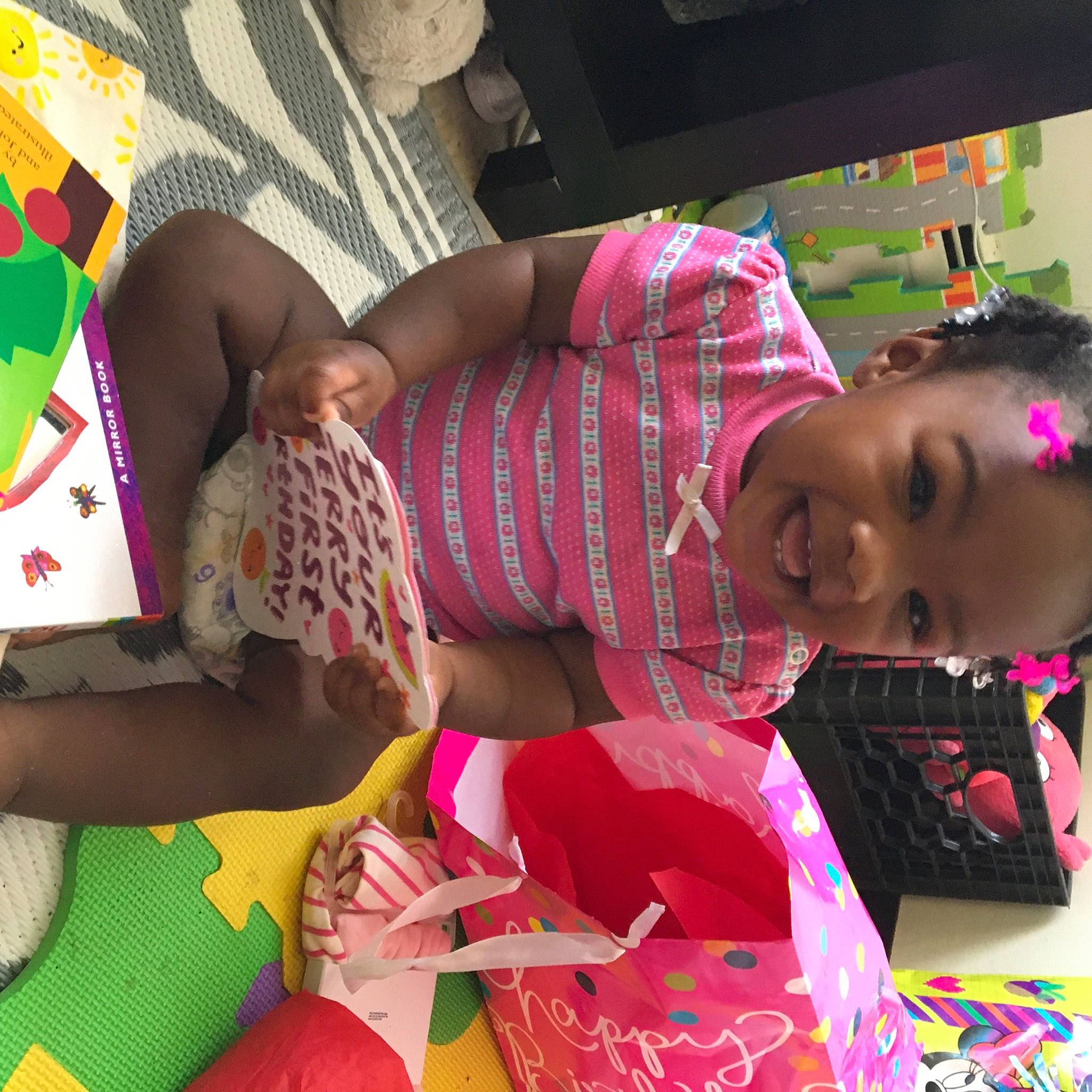 Jayvonna joined the competition — help win amazing prizes! beauty, child, facial_expression, fun, happy, human, human_leg, joy, lap, linens, magenta, party, pattern, person, pink, play, product, room, summer, textile