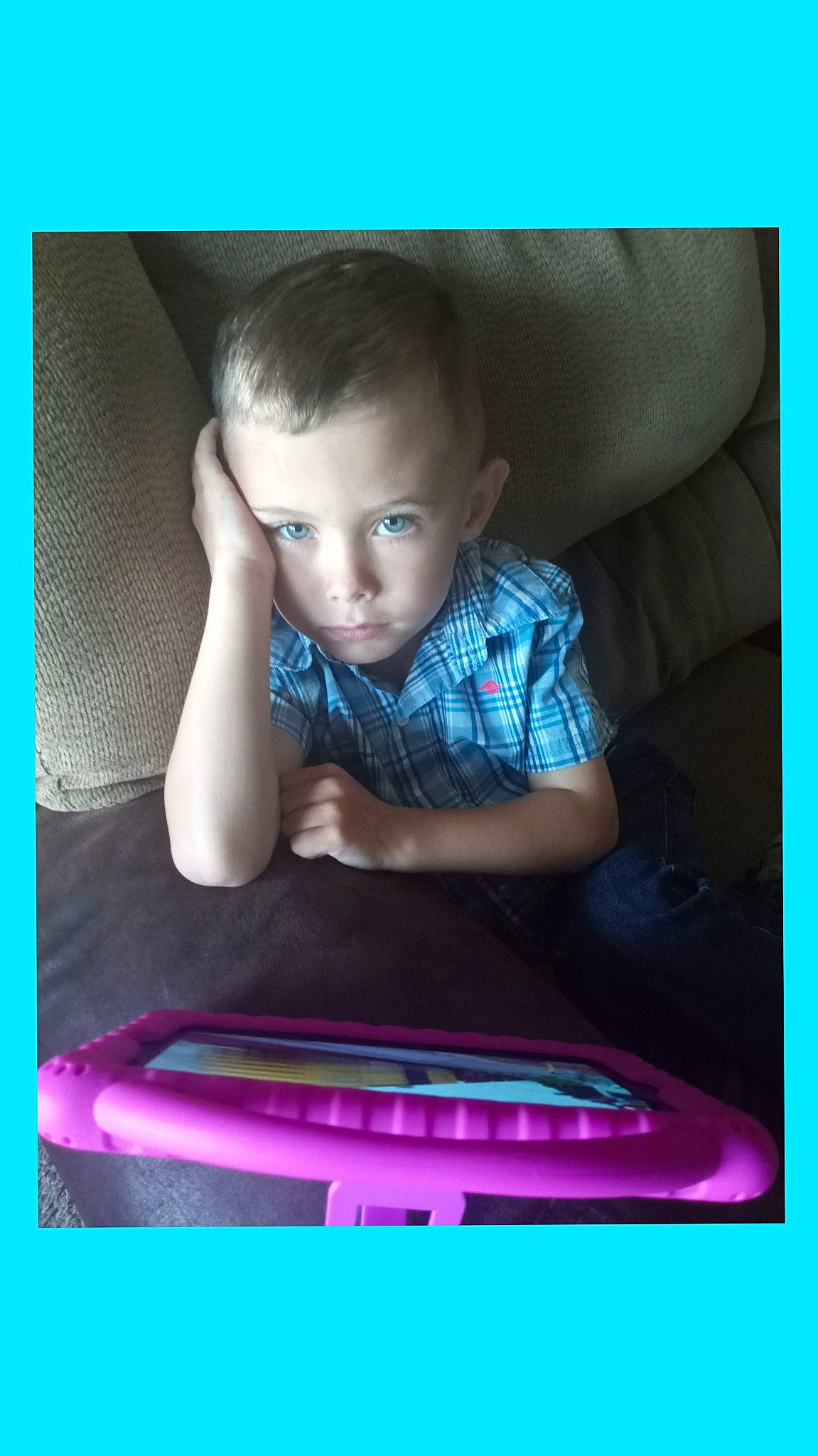 Ellis is registered to the contest to win money with this photo: arm, audio_equipment, baby, communication_device, display_device, electric_blue, electronic_device, flash_photography, gadget, magenta, netbook, office_equipment, output_device, person, product, purple, t_shirt, table, tablet_computer, technology