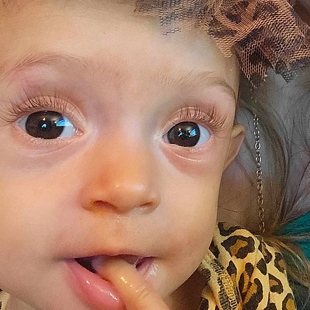 Lilyannerose joined the competition — help win amazing prizes! accessories, baby, bodypart, clothing, cream, dessert, earring, face, finger, food, hand, happy, hat, head, jewelry, mouth, person, photography, portrait, smile