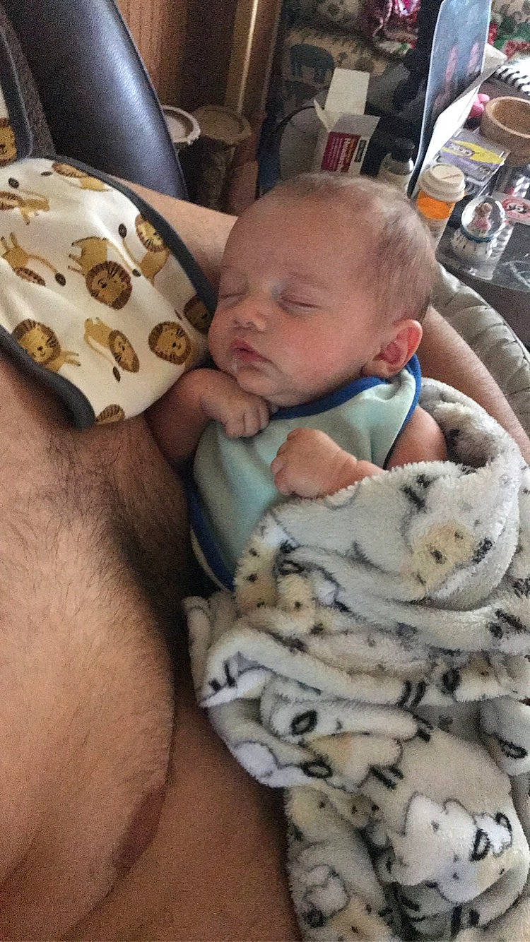 Kyler is registered to the contest to win money with this photo: baby, baby_products, baby_toddler_clothing, child, comfort, design, felidae, fur, human, linens, mammal, pattern, person, room, sitting, skin, terrestrial_animal, textile, toddler, toy