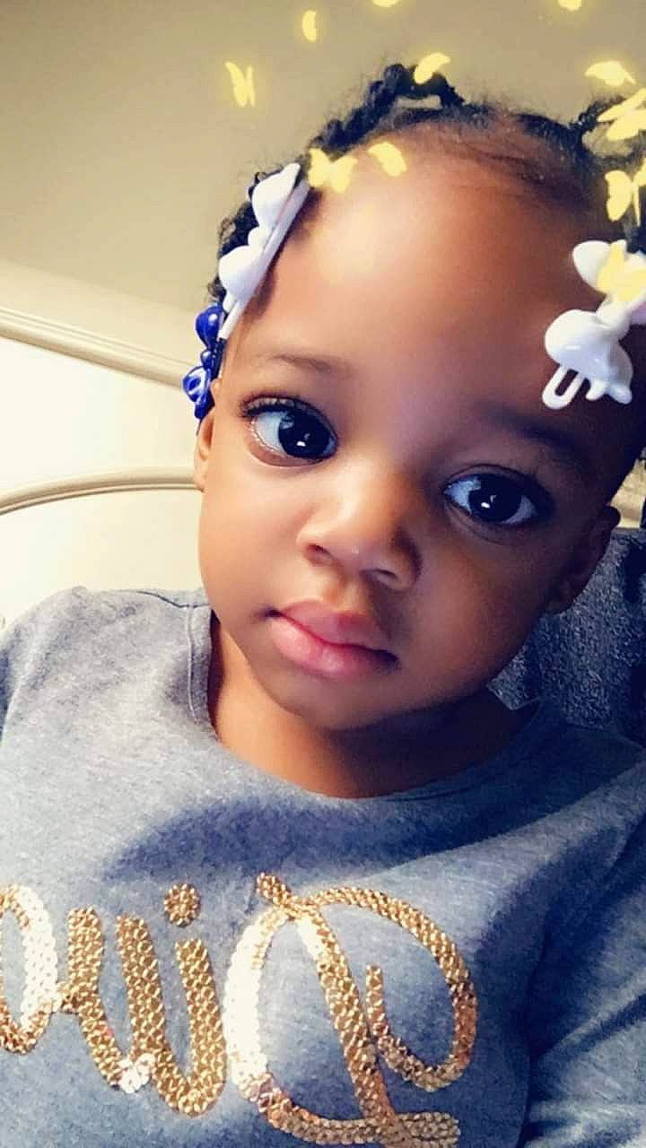 Aubrielle is registered to the contest to win money with this photo: black_hair, cheek, chin, cool, ear, electric_blue, eyebrow, eyelash, flash_photography, forehead, happy, headband, headpiece, iris, lip, nose, organ, person, skin, toddler