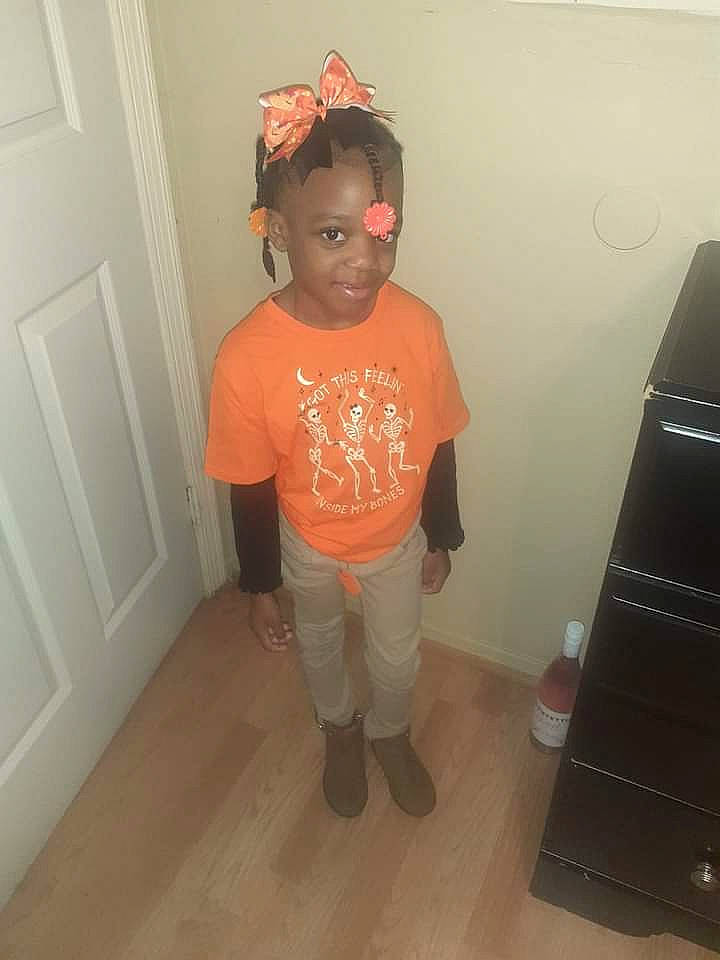 Aubrielle is registered to the contest to win money with this photo: baby_toddler_clothing, child, door, floor, flooring, fun, hardwood, home_door, laminate_flooring, pattern, person, shoulder, sleeve, smile, t_shirt, toddler, varnish, waist, wood, wood_flooring