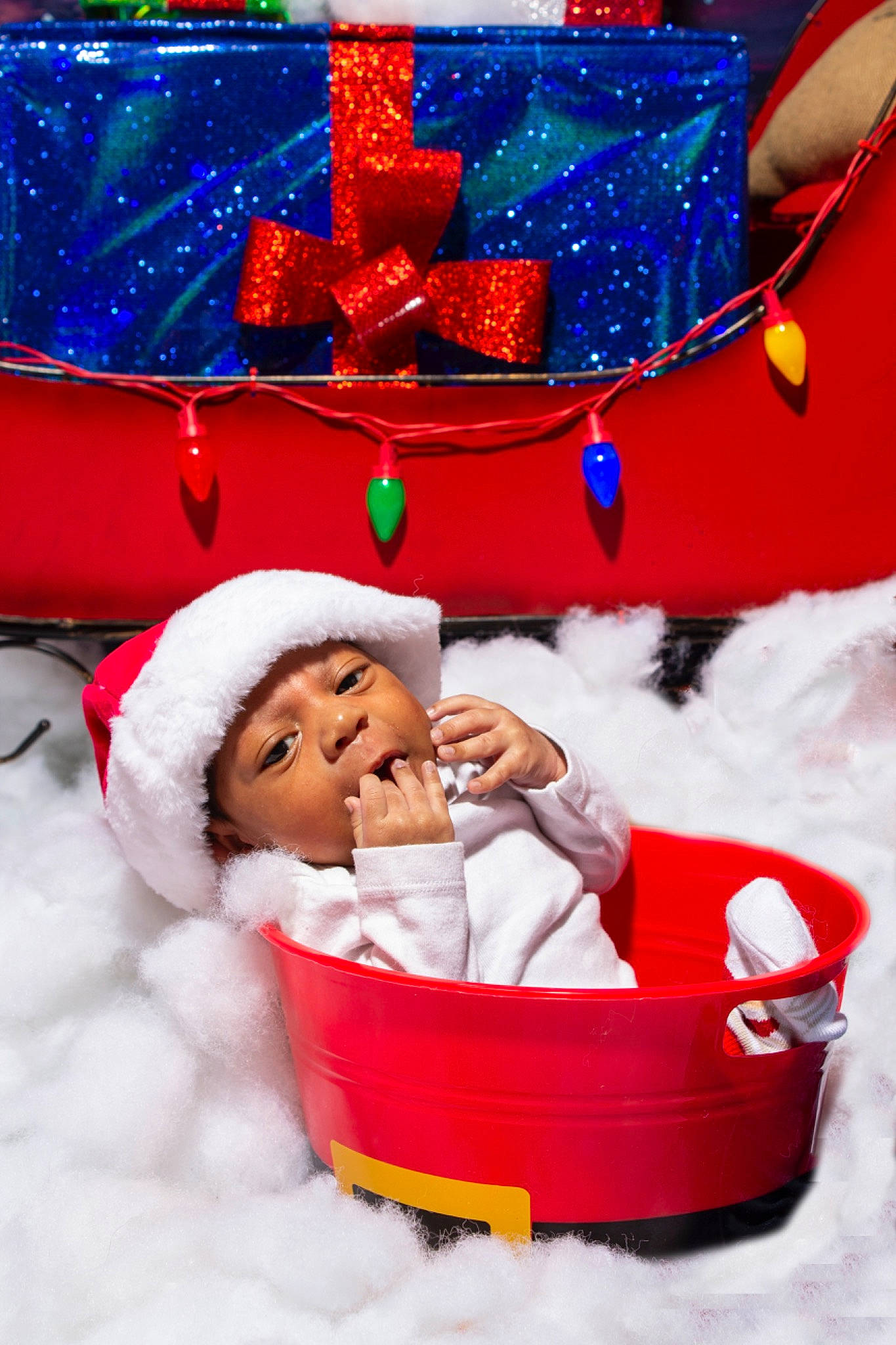Jamari joined the competition — help win amazing prizes! baby, baby_toddler_clothing, blue, christmas, christmas_decoration, christmas_eve, christmas_ornament, comfort, event, fun, happy, headwear, holiday, lap, ornament, person, red, santa_claus, snow, toddler