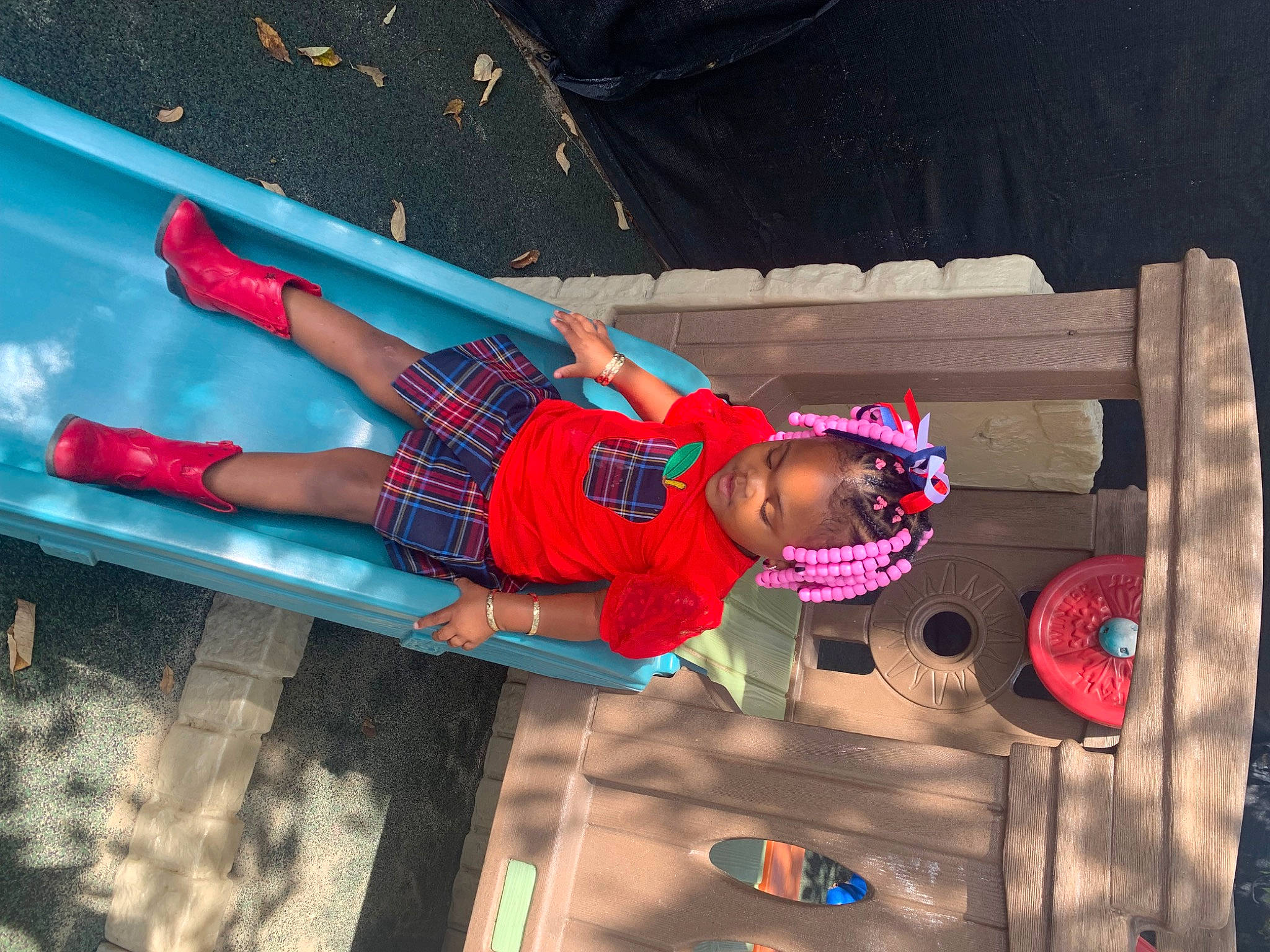 Harley is registered to the contest to win money with this photo: carmine, child, electric_blue, entertainment, fun, hat, human_leg, leisure, magenta, pattern, person, pink, play, recreation, sandal, thigh, toddler, vacation