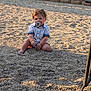 Elrey joined the competition — help win amazing prizes! toddler, child, pacifier, gravel, sunlight, outdoor, sitting, shorts, shirt, brick_wall, table, legs, hands, curly_hair, baby, casual_clothing, daylight, playground, nature, person