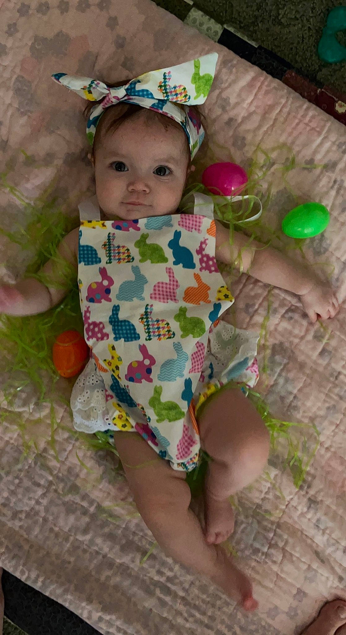 Hennsley is registered to the contest to win money with this photo: baby, baby_products, baby_toddler_clothing, baby_toys, child, eye, grass, green, happy, linens, pattern, person, pink, play, sitting, skin, sleeve, smile, t_shirt, toddler