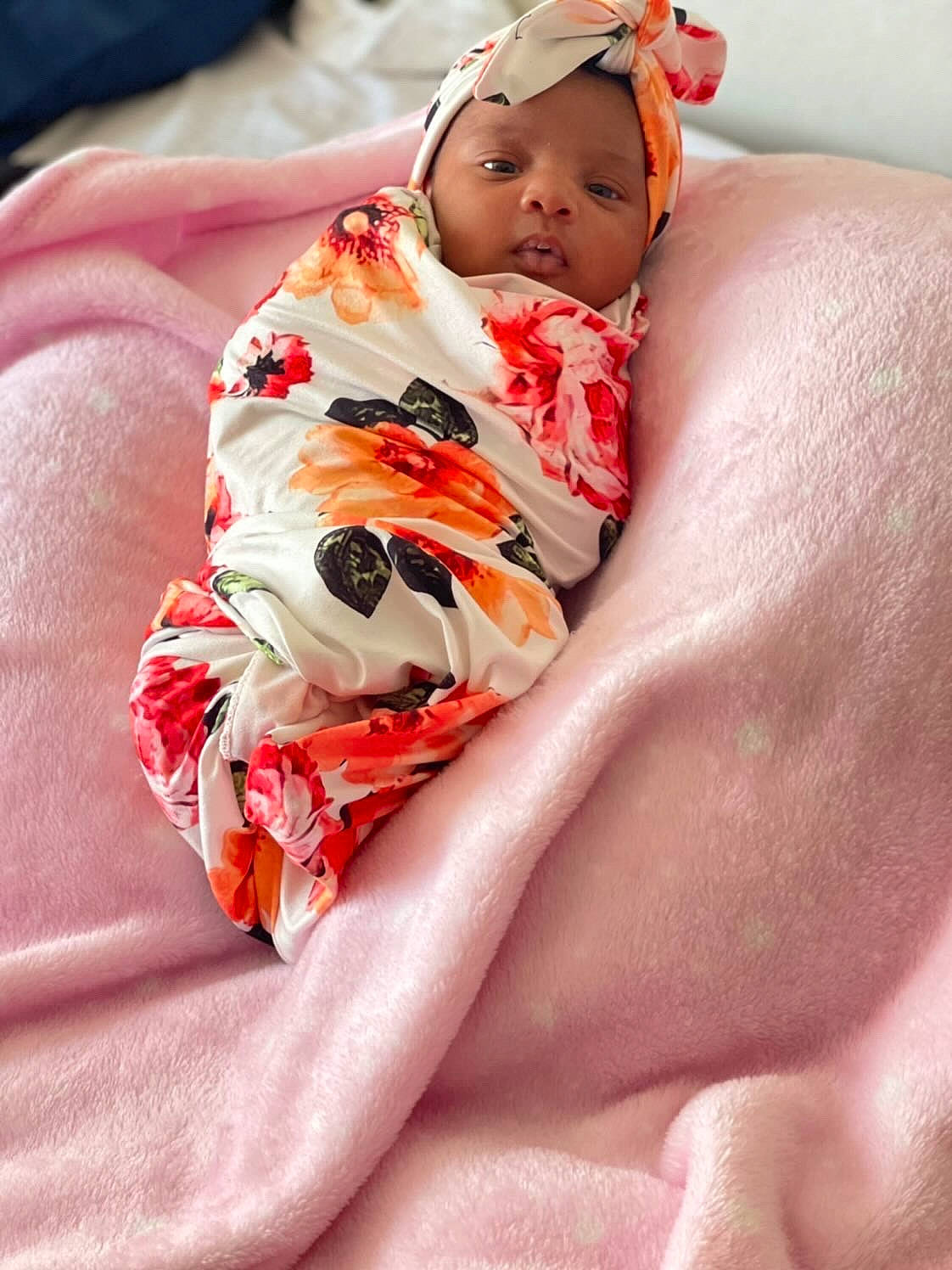 Jaylani joined the competition — help win amazing prizes! abdomen, baby, baby_products, baby_sleeping, baby_toddler_clothing, bed_sheet, bedding, bedtime, carmine, child, comfort, foot, headwear, human_leg, knee, linens, pattern, person, pink, room