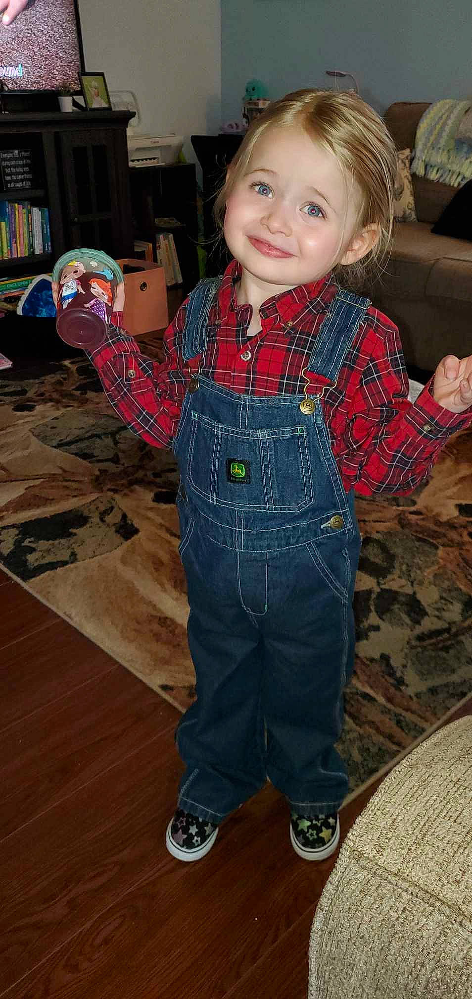 Aurora joined the competition — help win amazing prizes! baby_toddler_clothing, child, cool, denim, floor, flooring, fun, hairstyle, head, joy, leg, pattern, person, plaid, shelf, skin, sleeve, smile, tartan, toddler