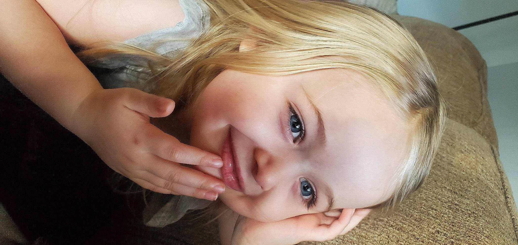 Aurora is registered to the contest to win money with this photo: cheek, dress, ear, eye, eyebrow, eyelash, flash_photography, forehead, gesture, hand, happy, iris, jaw, joy, lip, neck, nose, person, plant, skin