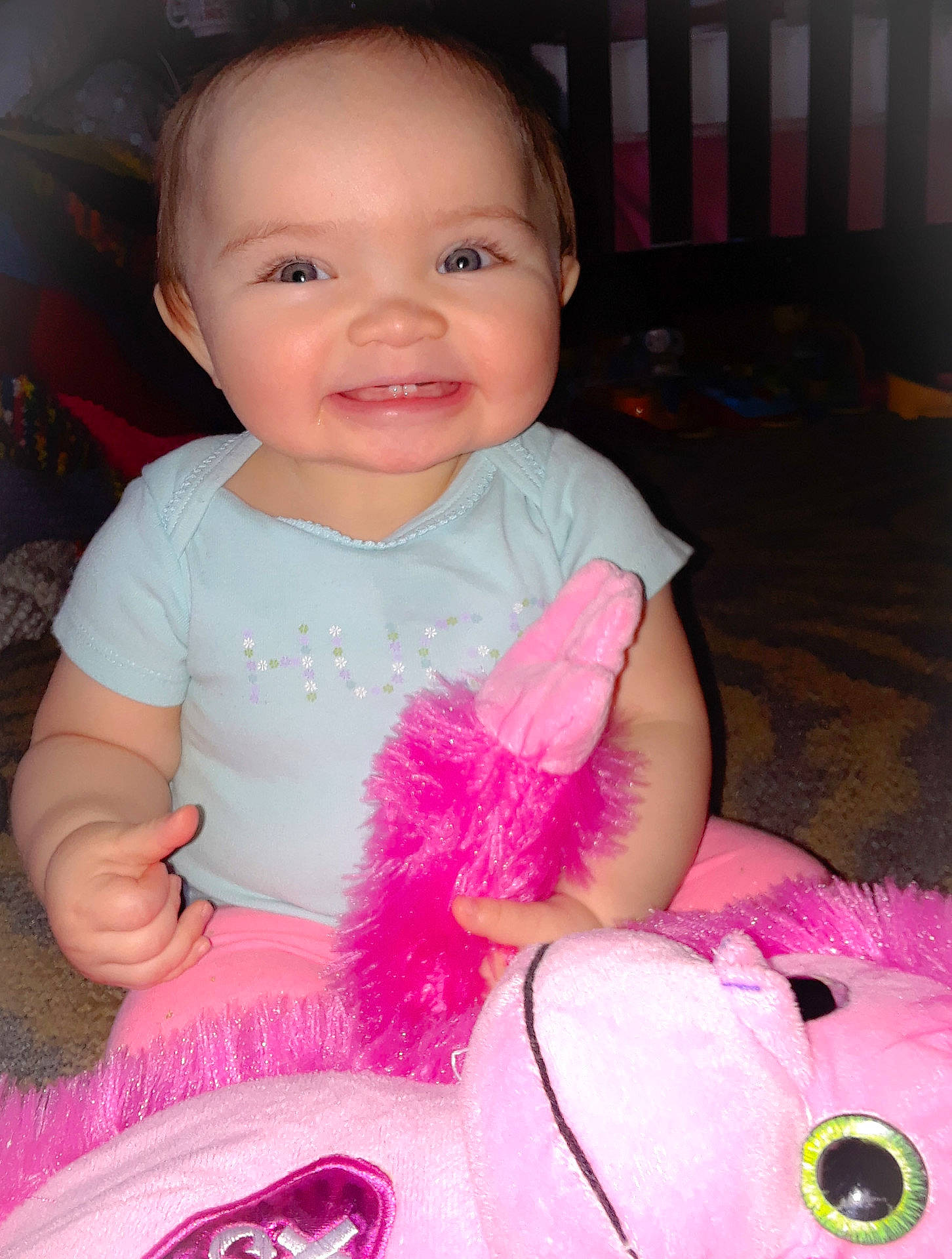 Anya is registered to the contest to win money with this photo: cheek, child, day, eye, face, fun, girl, head, human_hair_color, infant, iris, joy, lip, magenta, mouth, person, pink, product, skin, smile