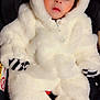 Muhammad Balaaj is registered to the contest to win money with this photo: baby, child, infant, fluffy_suit, white, hooded, car_seat, striped_mittens, cute, wide_eyes, surprised_expression, soft_texture, warm_clothing, indoor, portrait, one_person, infant_clothing, adorable, seated, winter_wear