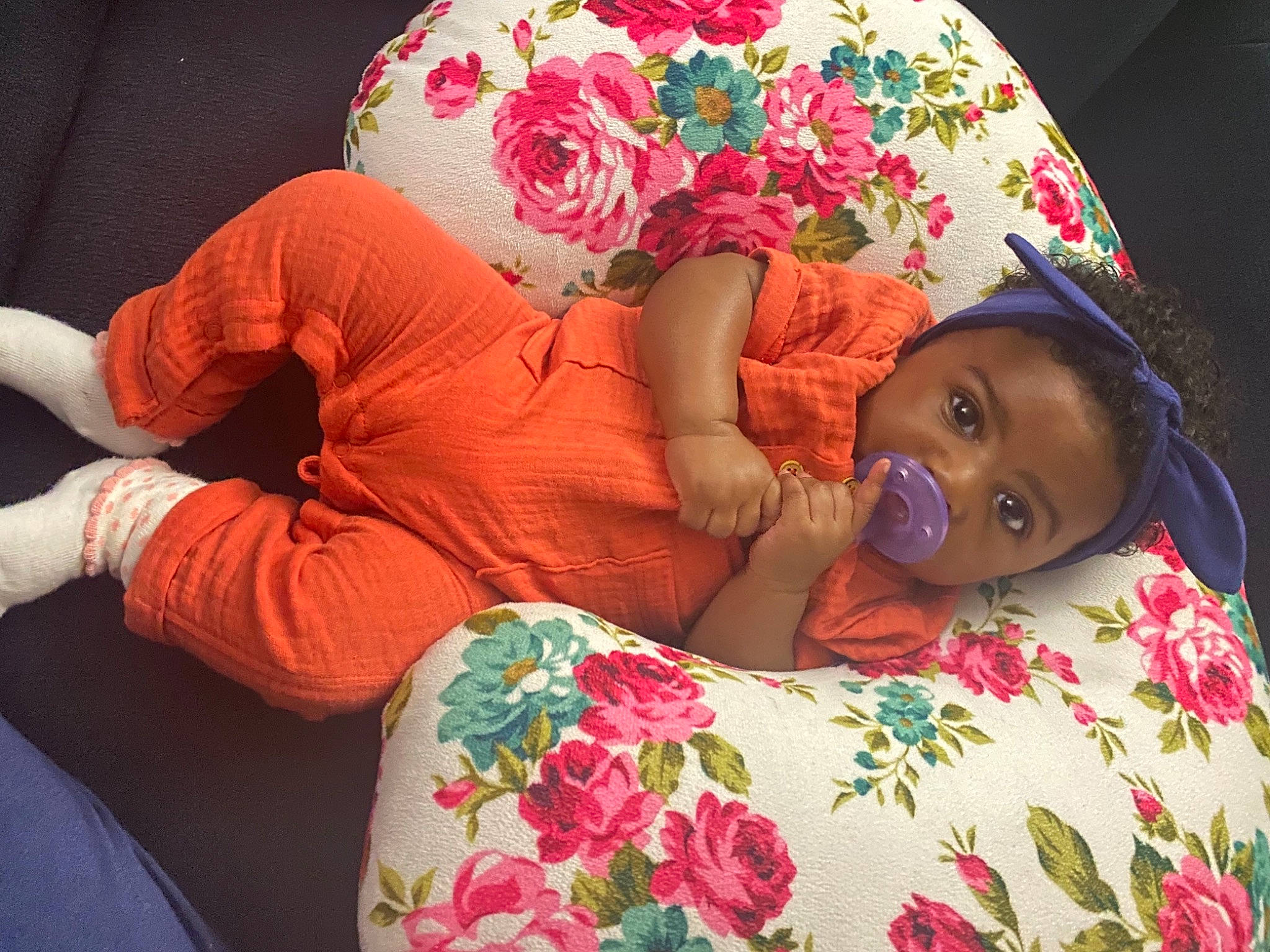 Leila is registered to the contest to win money with this photo: baby, bedtime, birth, child, comfort, flower, nap, person, pink, plant, toddler