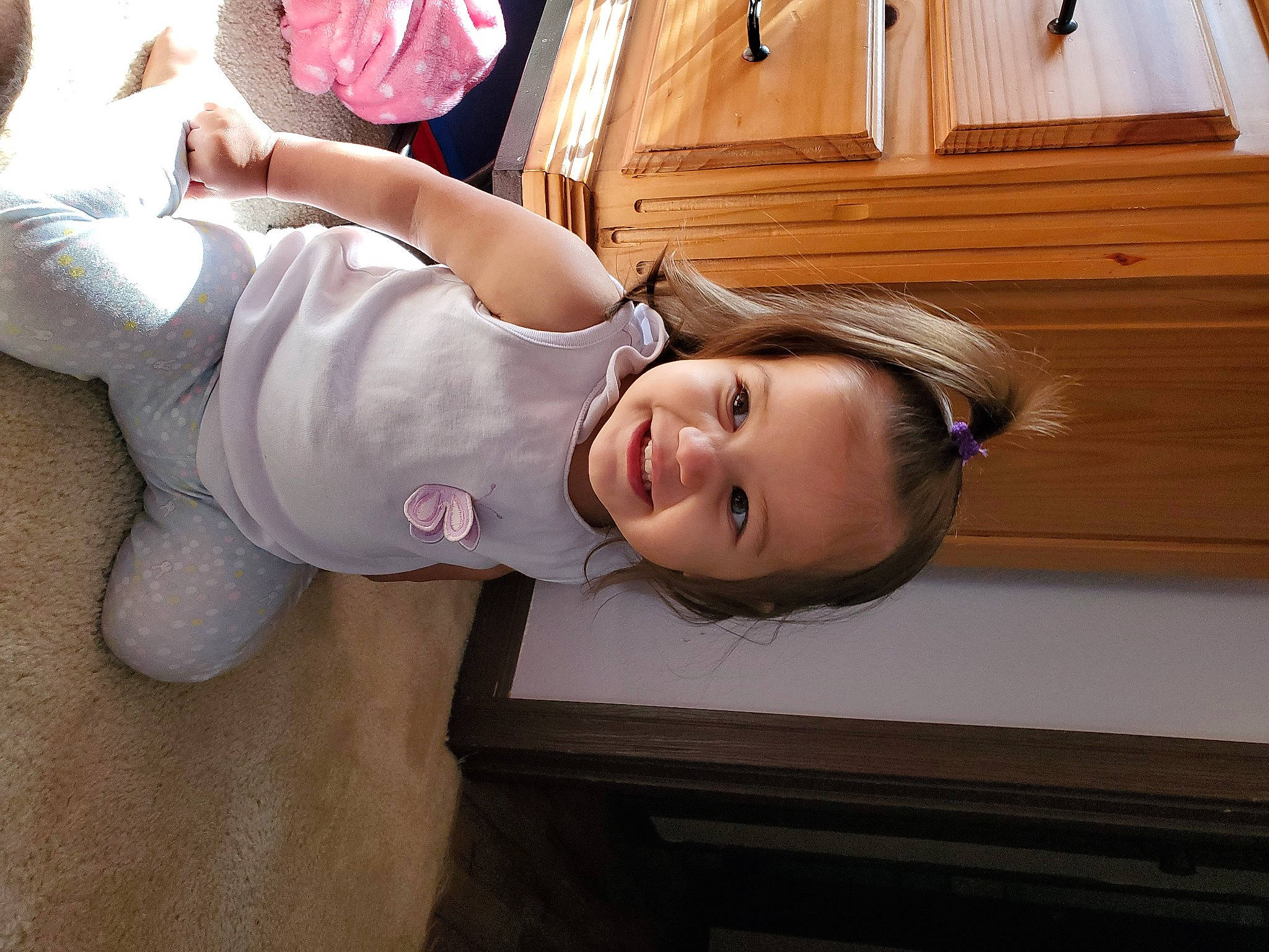 Amara is registered to the contest to win money with this photo: child, joy, leg, person