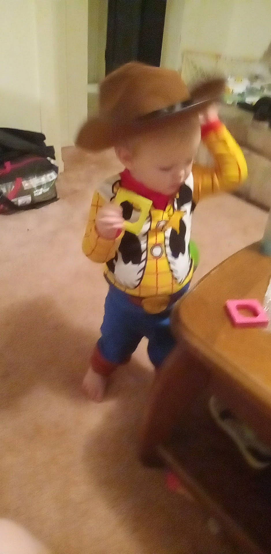 Andrew joined the competition — help win amazing prizes! baby, baby_toddler_clothing, baby_toys, carmine, child, costume_hat, cowboy_hat, fedora, figurine, flooring, happy, hat, person, play, sitting, sleeve, stuffed_toy, sun_hat, table, toy