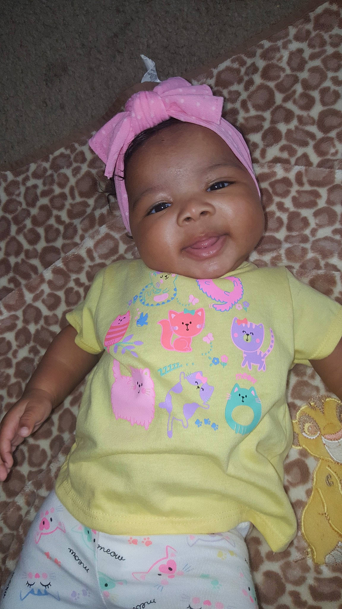 Seraphina is registered to the contest to win money with this photo: baby, baby_products, baby_toddler_clothing, cheek, child, hair_accessory, head, headgear, person, pink, skin, smile, toddler