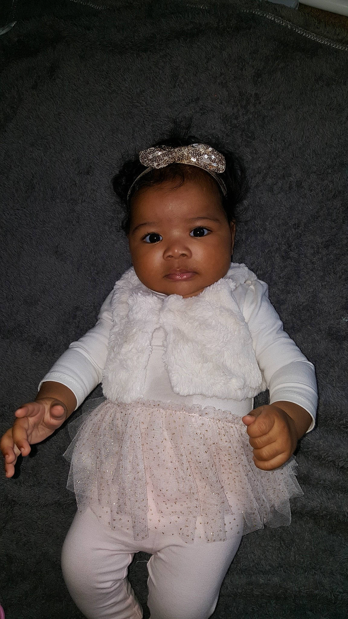 Seraphina is registered to the contest to win money with this photo: baby, baby_toddler_clothing, child, hair_accessory, headpiece, person, toddler