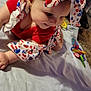 Naomi joined the competition — help win amazing prizes! baby, infant, headband, red_clothing, crawling, blanket, toys, carpet, indoor, child, cute, face, smiling, person, floor, furniture, playtime, colorful, home, young