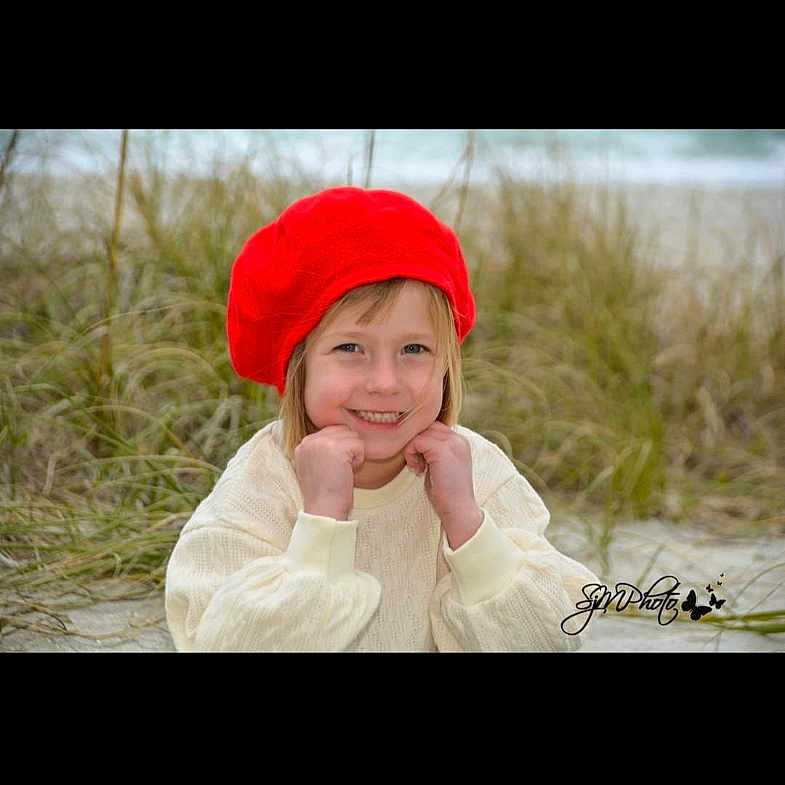 Margo Elizabeth is registered to the contest to win money with this photo: baby, baseballcap, bodypart, bonnet, cap, clothing, coat, face, finger, grass, hand, happy, hat, head, jacket, person, photography, plant, portrait, smile