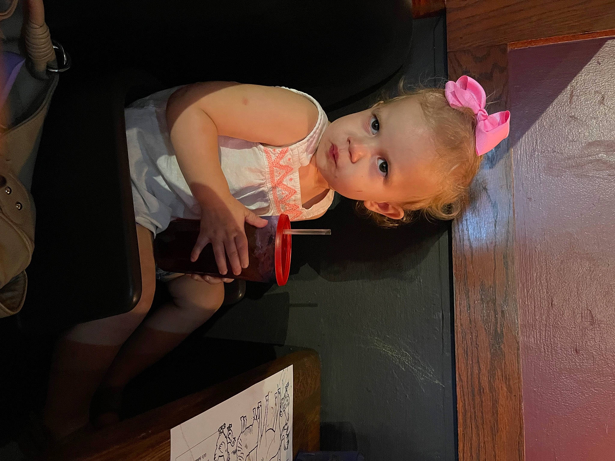 Emma is registered to the contest to win money with this photo: baby, baby_products, baby_toddler_clothing, box, child, costume, fun, human_body, human_leg, person, room, sitting, thigh, toddler