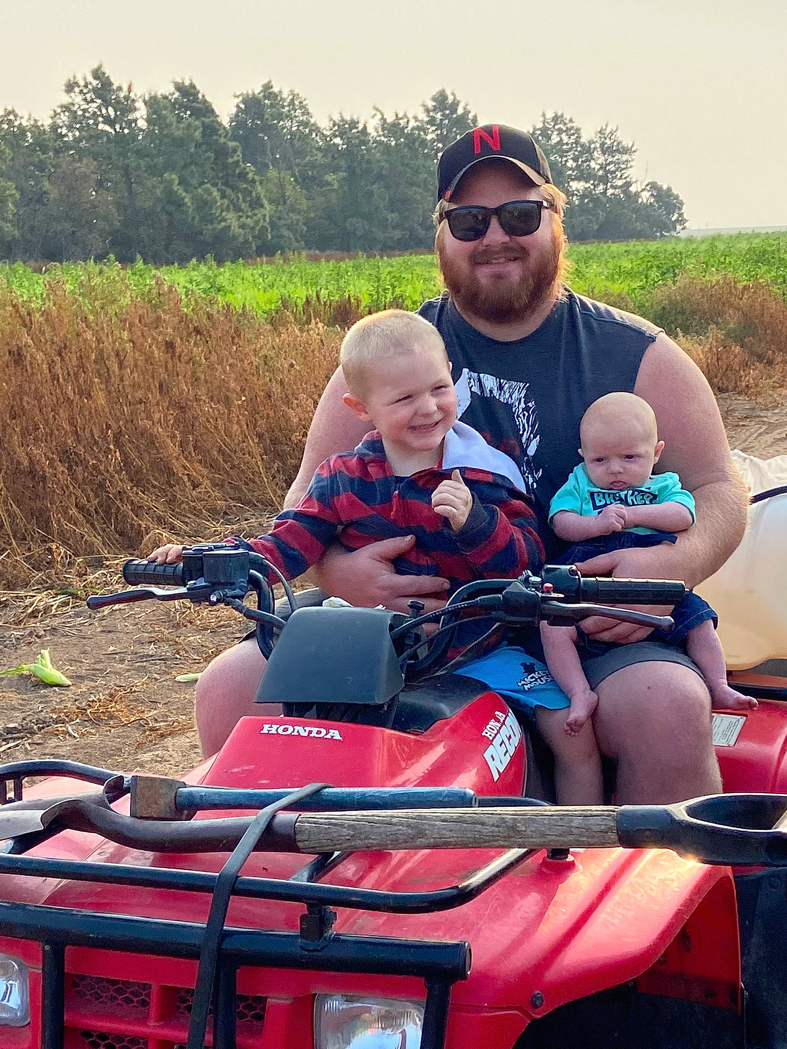 Klayton is registered to the contest to win money with this photo: automotive_design, automotive_exterior, automotive_lighting, automotive_tire, bumper, glasses, goggles, headwear, hood, joy, mode_of_transport, motor_vehicle, person, photograph, plant, sky, smile, sunglasses, tire, vehicle