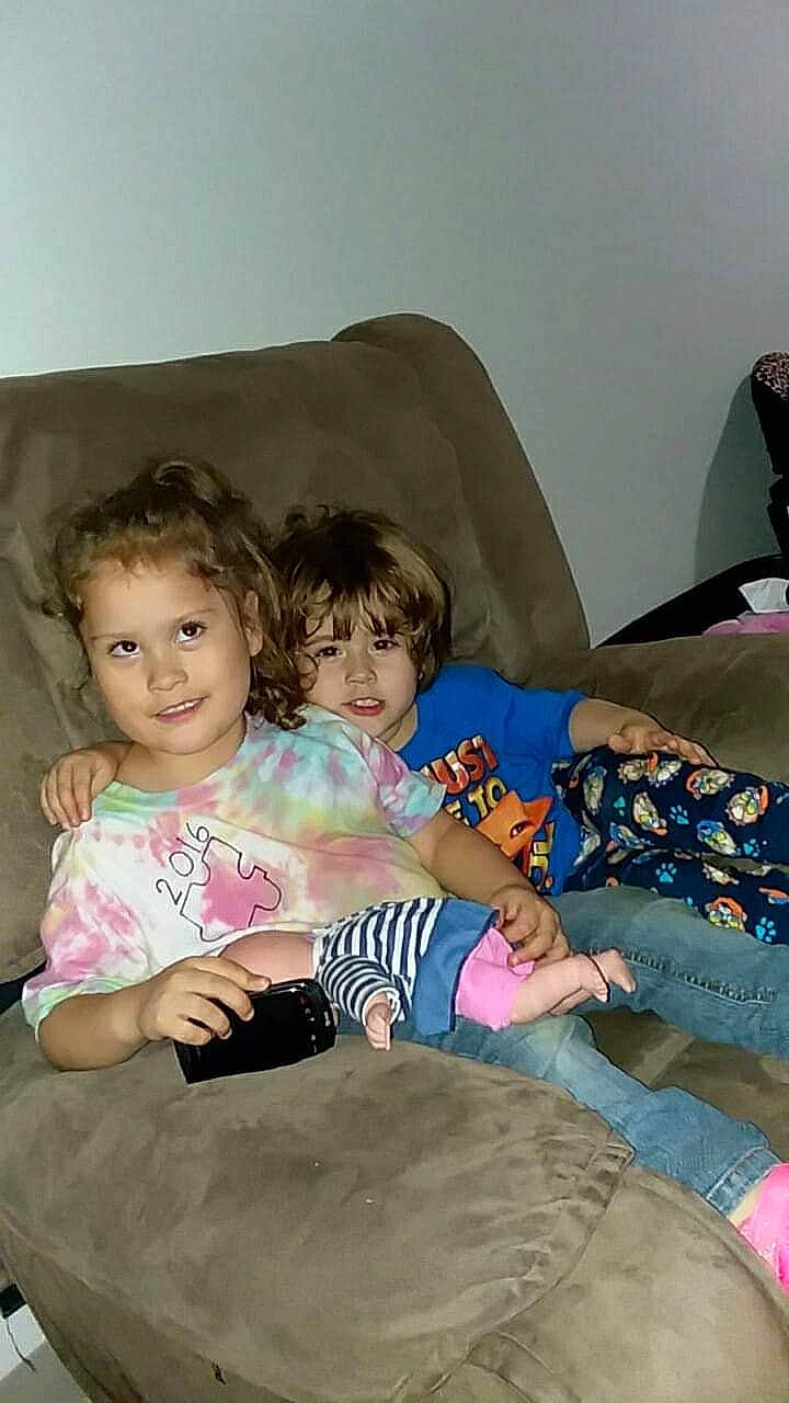 Yolanda is registered to the contest to win money with this photo: baby, baby_toddler_clothing, child, comfort, couch, event, fun, happy, iris, joy, lap, leisure, linens, living_room, person, play, room, sharing, sitting, smile