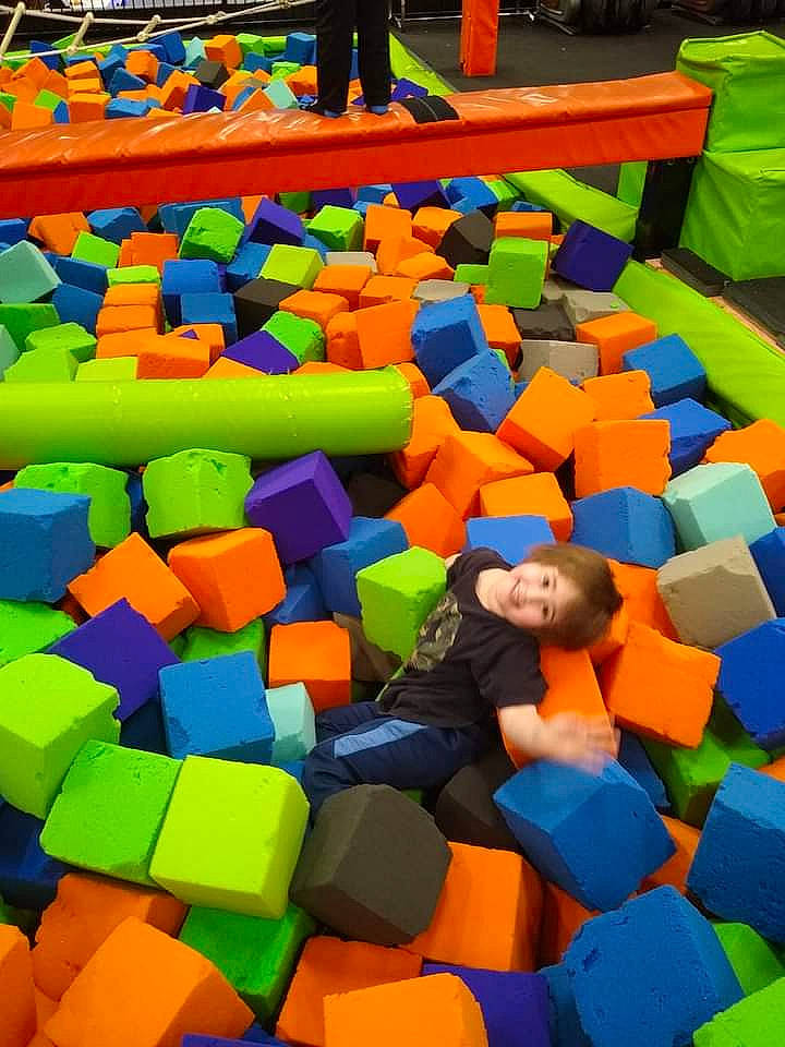 Willy is registered to the contest to win money with this photo: comfort, electric_blue, fun, games, grass, inflatable, joy, leisure, pattern, person, plastic, play, puzzle, recreation, rectangle, room, symmetry