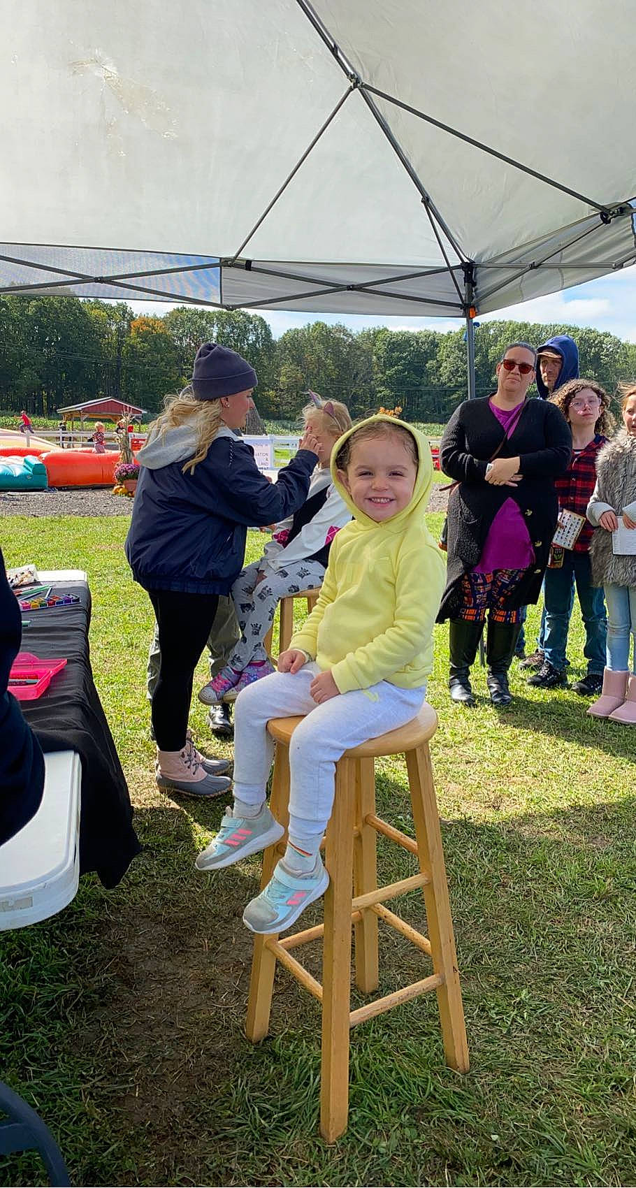 Maleigha joined the competition — help win amazing prizes! chair, community, event, fun, grass, hat, headwear, jeans, joy, lawn, leisure, outdoor_furniture, people, person, plant, pole, public_space, recreation, shoe, shorts