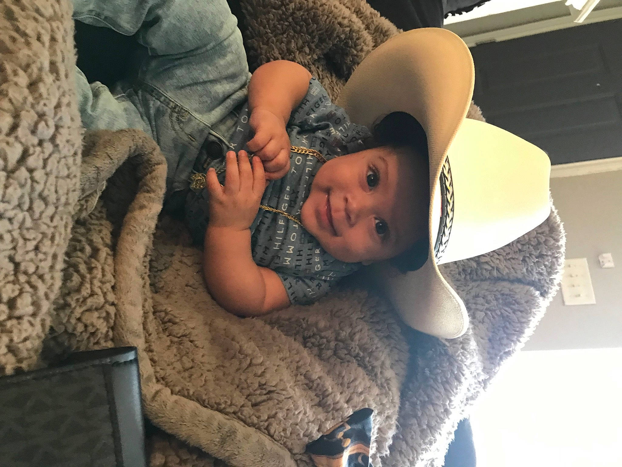 Alejandro joined the competition — help win amazing prizes! abdomen, baby, black_hair, chest, child, comfort, couch, eyewear, fashion, fashion_accessory, flash_photography, fun, happy, headwear, human_leg, joint, joy, person, sitting, skin