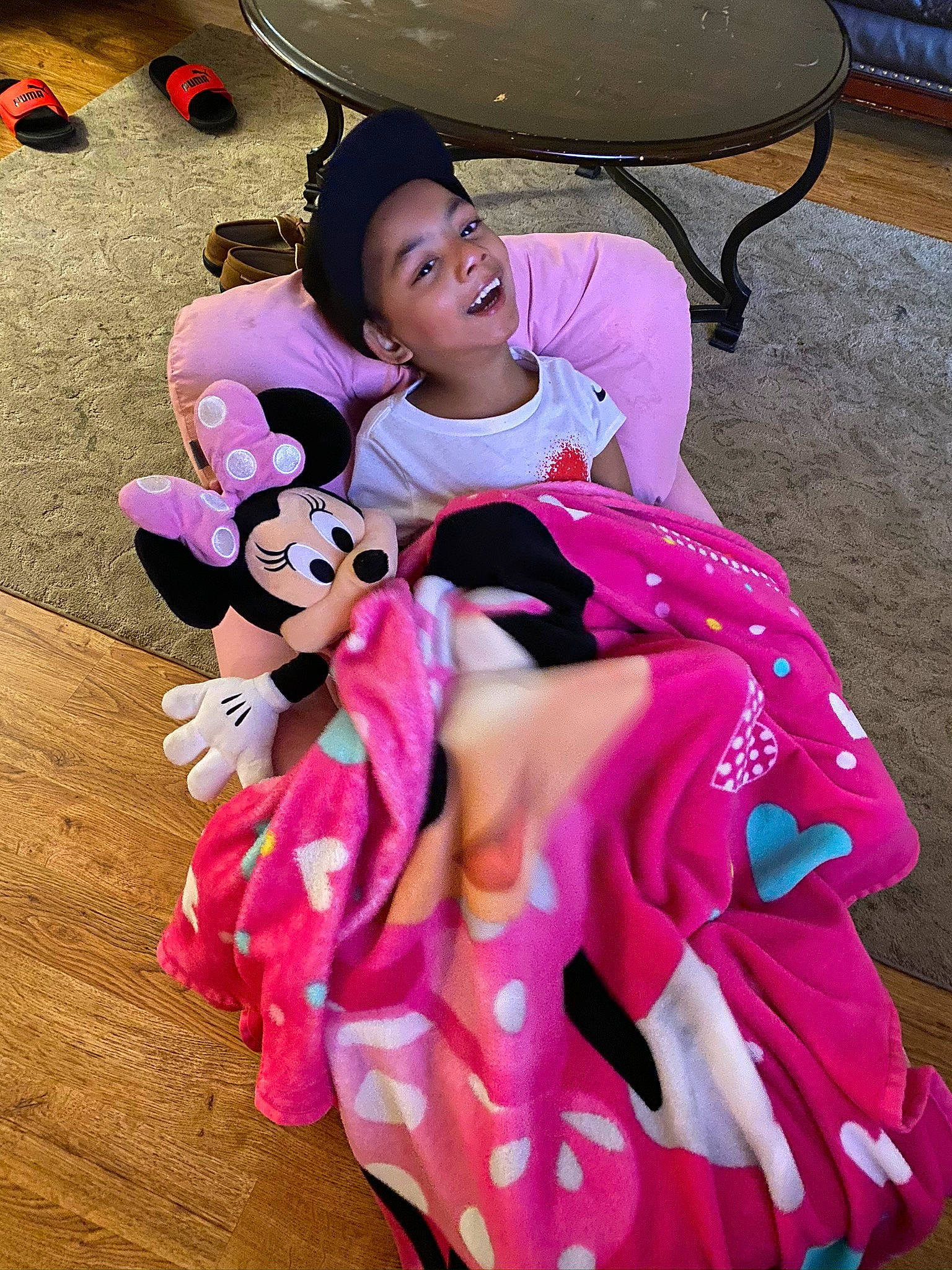 Hailee is registered to the contest to win money with this photo: child, costume, entertainment, event, face, fictional_character, fun, happy, head, human_leg, leisure, magenta, performing_arts, person, pink, purple, recreation, sandal, sitting, thigh