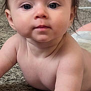 Lylajayne is registered to the contest to win money with this photo: baby, infant, face, skin, eyes, cheeks, arm, carpet, floor, closeup, cute, child, curious, expression, lying_down, indoors, portrait, hair, mouth, nose