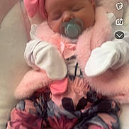 Aurora Rose joined the competition — help win amazing prizes! baby, infant, pacifier, sleeping, pink, clothing, mittens, headband, floral, cute, soft, blanket, infant_clothes, newborn, child, cozy, resting, adorable, portrait, babywear