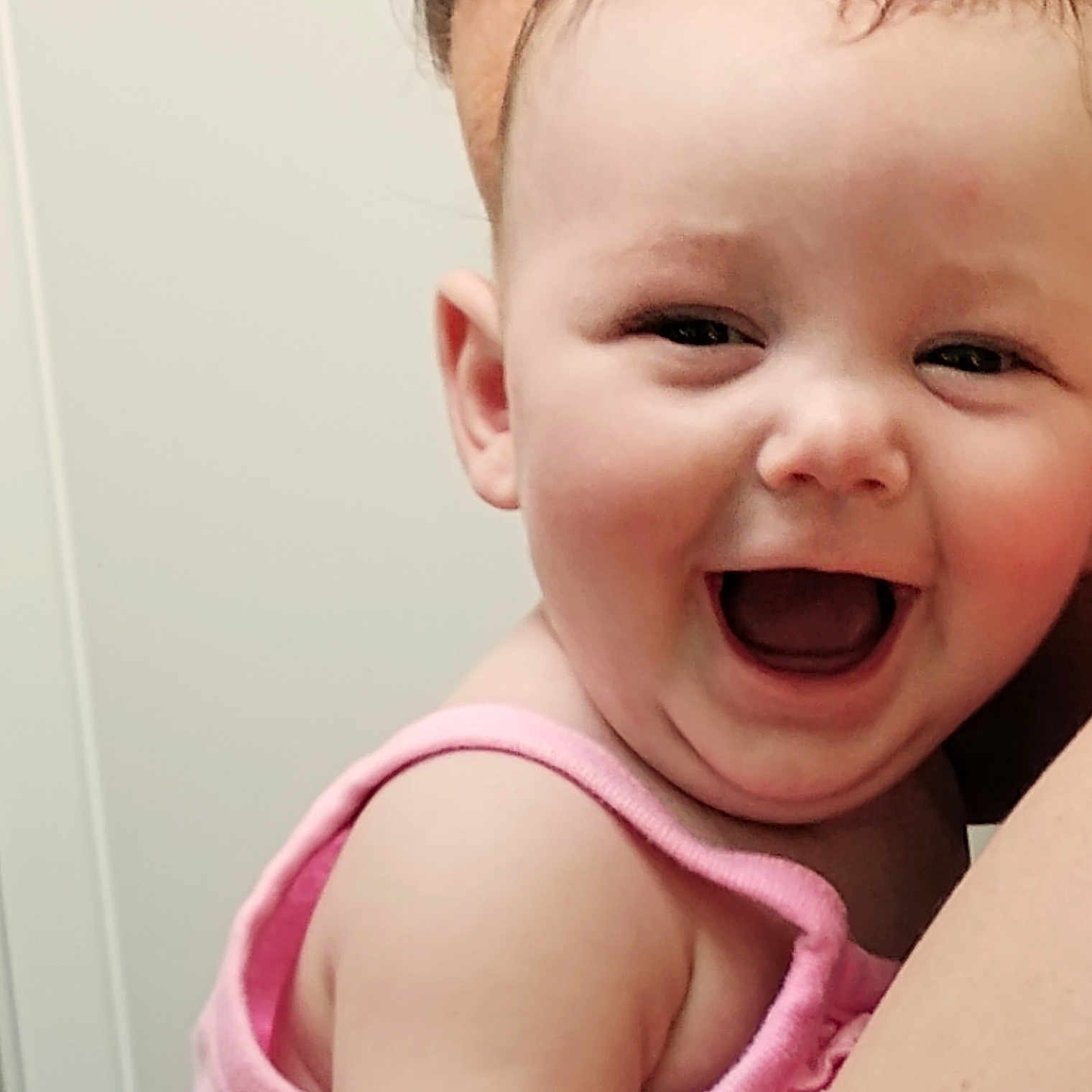 Bailey Aurora joined the competition — help win amazing prizes! arm, baby, cheerful, child, closeup, cute, expression, face, happiness, head, human, indoor, infant, joy, person, pink_clothing, portrait, skin, smile, young