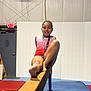 athlete, balance_beam, child, competition, exercise, foot, girl, gym, gymnast, gymnastics, happy, indoor, mat, medal, pose, smile, sport, sport_equipment, training, young_athlete