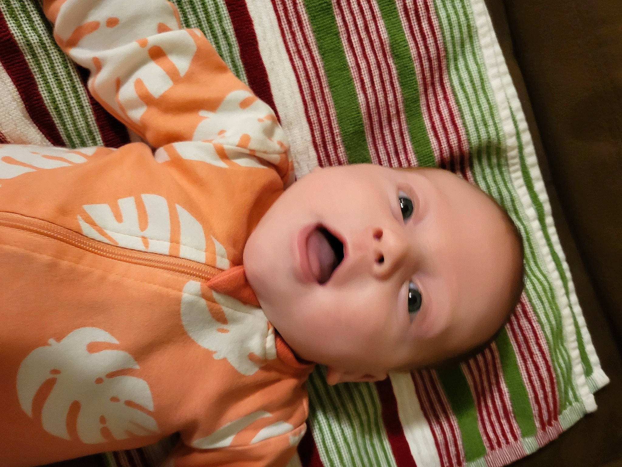 Desmond is registered to the contest to win money with this photo: baby, baby_products, baby_toddler_clothing, cheek, child, chin, eye, eyebrow, eyelash, head, human_body, iris, lip, mammal, nose, pattern, person, skin, textile, toddler