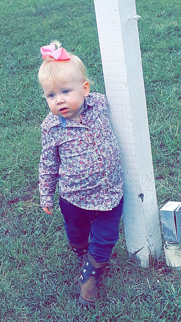 Haven is registered to the contest to win money with this photo: baby_toddler_clothing, child, design, grass, outerwear, pattern, person, pink, plant, play, sleeve, standing, t_shirt, toddler