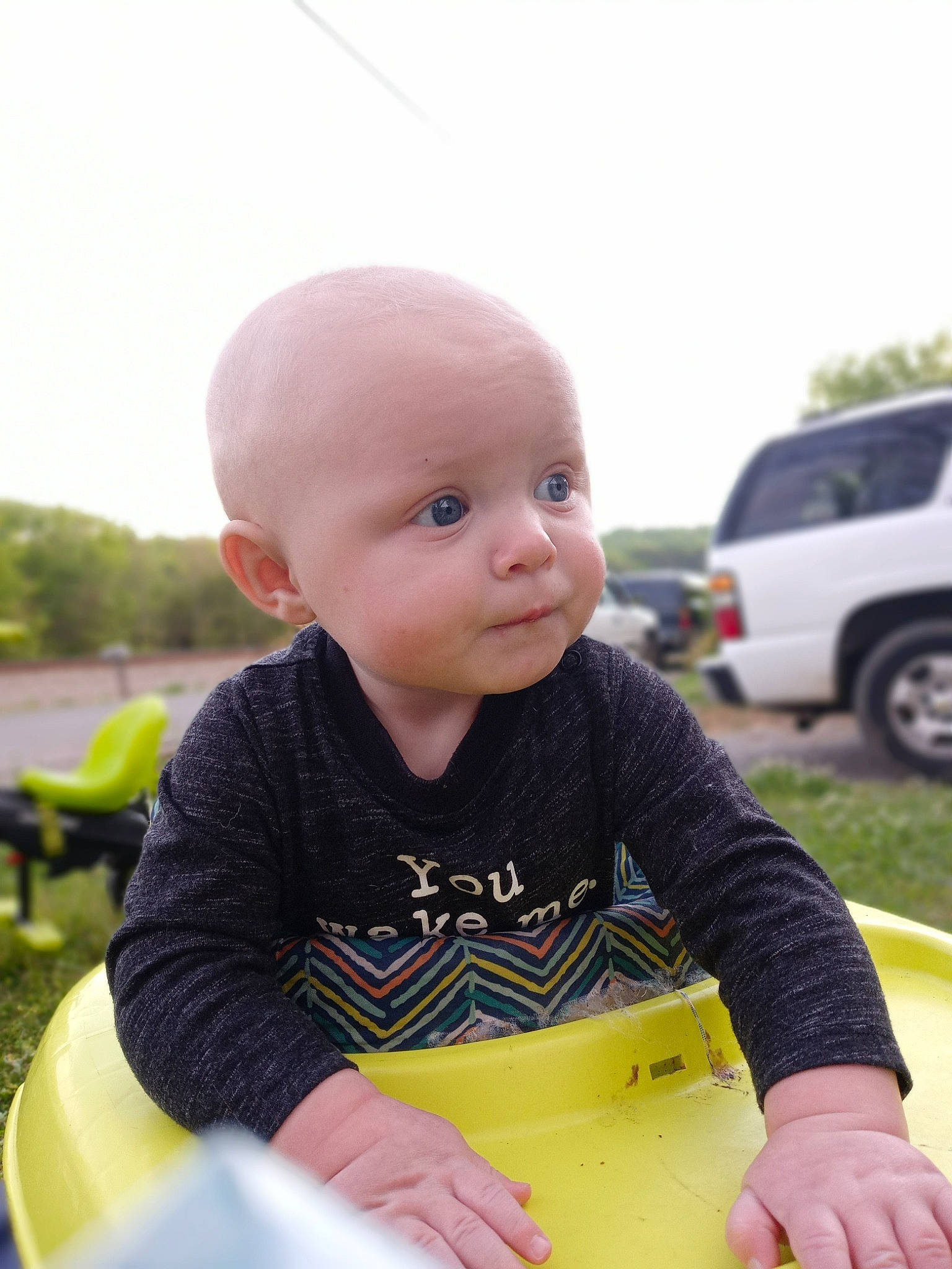 Houston joined the competition — help win amazing prizes! automotive_tire, baby, baby_toddler_clothing, car, child, family_car, fun, grass, happy, leisure, person, recreation, sitting, sky, sleeve, smile, t_shirt, tire, toddler, vacation