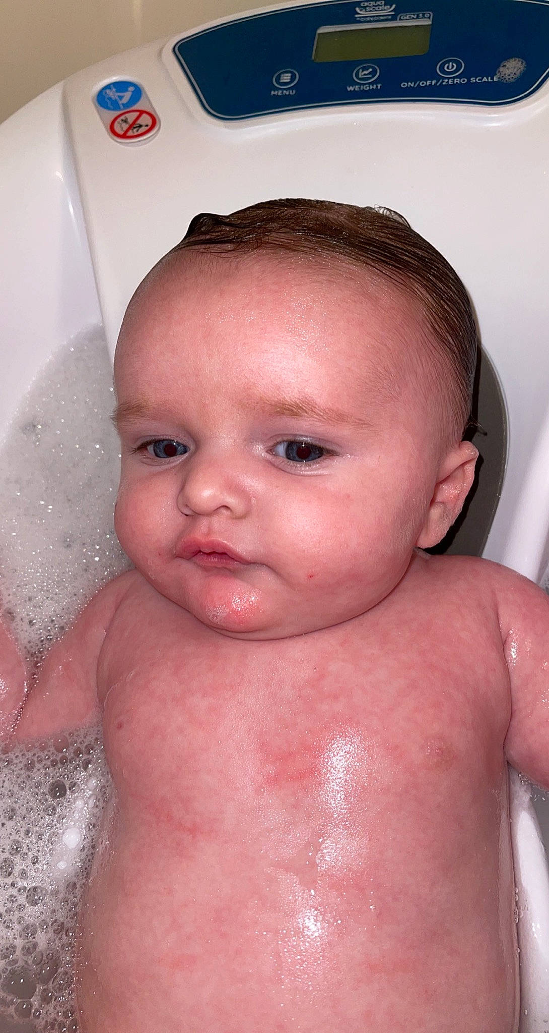 Curtis is registered to the contest to win money with this photo: baby_bathing, bathroom, bathtub, cheek, chin, ear, eye, eyebrow, eyelash, face, forehead, hand, jaw, lip, mouth, nose, organ, person, plumbing_fixture, skin