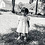 black_and_white, child, cute, daytime, grass, innocent, nature, outdoor, person, portrait, shadow, shoes, short_hair, standing, sunlight, toddler, trees, white_dress, yard, young_child