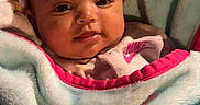 Amariana is registered to the contest to win money with this photo: baby, babywear, blanket, child, clothing, comfort, cozy, cute, face, head, indoors, infant, newborn, person, portrait, smile, soft, toddler, warm, wrapped