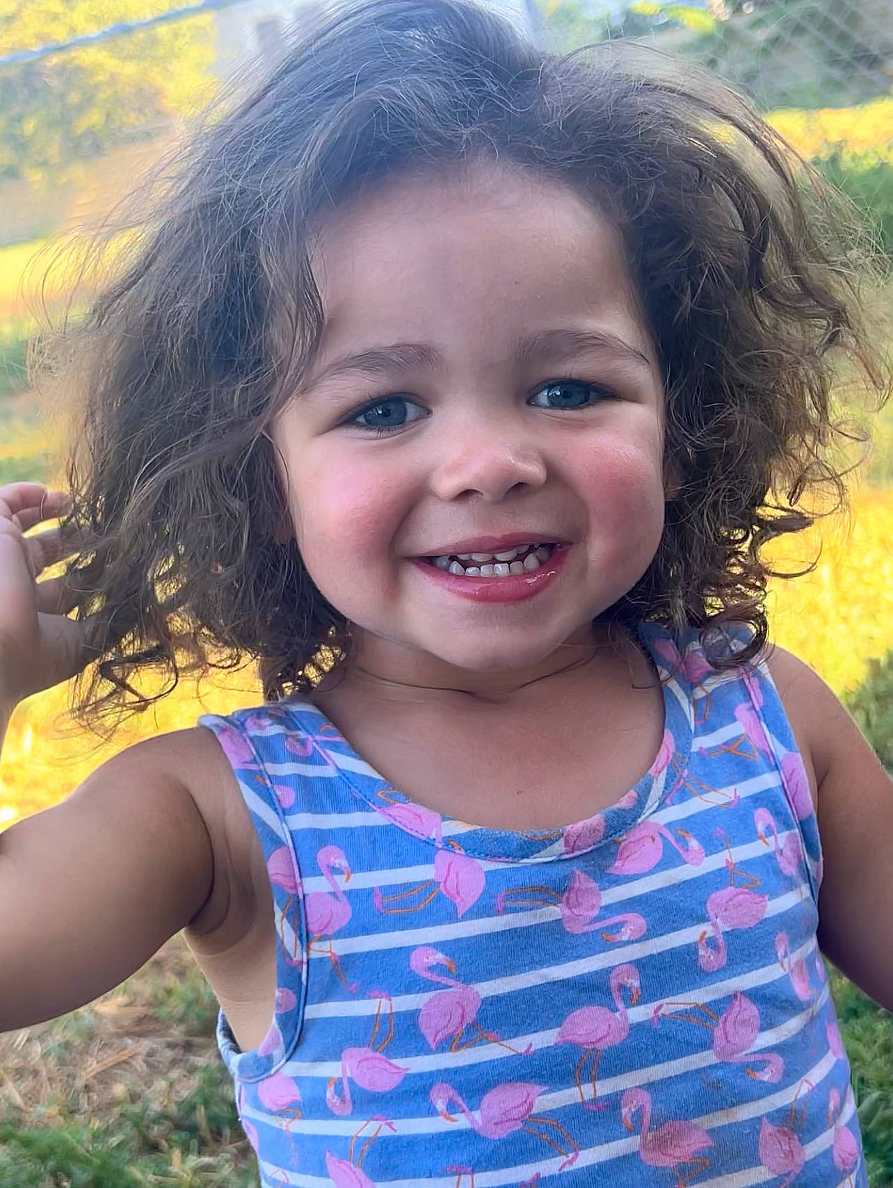 Eliza is registered to the contest to win money with this photo: cheek, chin, eye, face, facial_expression, grass, happy, head, human, iris, joy, leaf, lip, mouth, nose, people_in_nature, person, plant, shoulder, skin