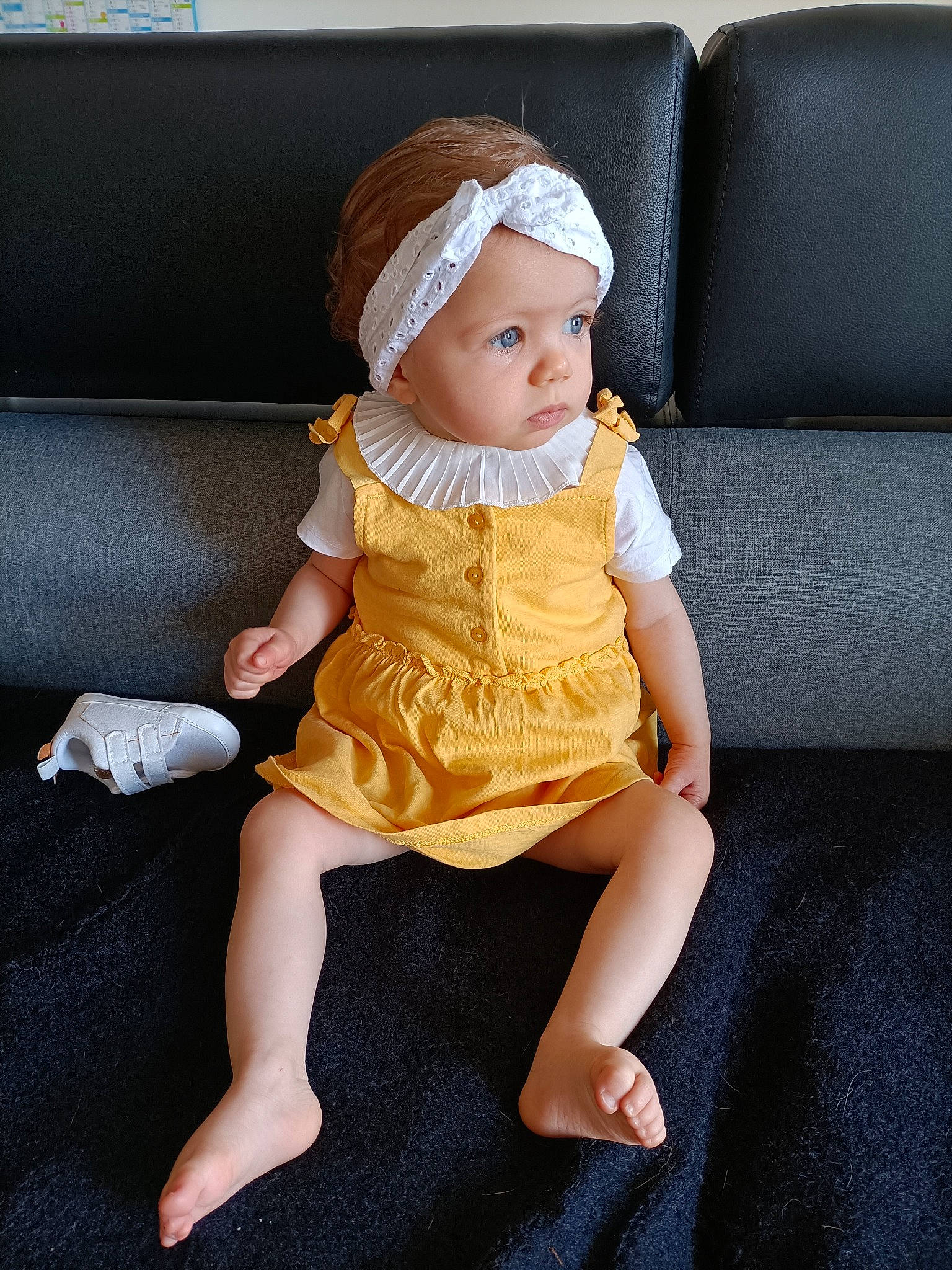 élena participe au concours pour gagner de l'argent avec cette photo : baby, baby_toddler_clothing, cap, chair, child, comfort, couch, dress, fashion_accessory, hand, hat, headwear, human_leg, jewellery, lap, leg, person, sitting, skin, sun_hat