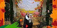 Yuki joined the competition — help win amazing prizes! autumn, background, bench, costume, decor, dog, fall, festive, hay_bale, husky, leaves, man, outdoor, plants, portrait, pumpkin, scarecrow, smiling, sunflowers, wood