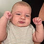 baby, child, infant, person, face, skin, arm, clothing, striped, onesie, fist, expression, cute, chubby, holding, adult, portrait, indoor, skin_tone, closeup