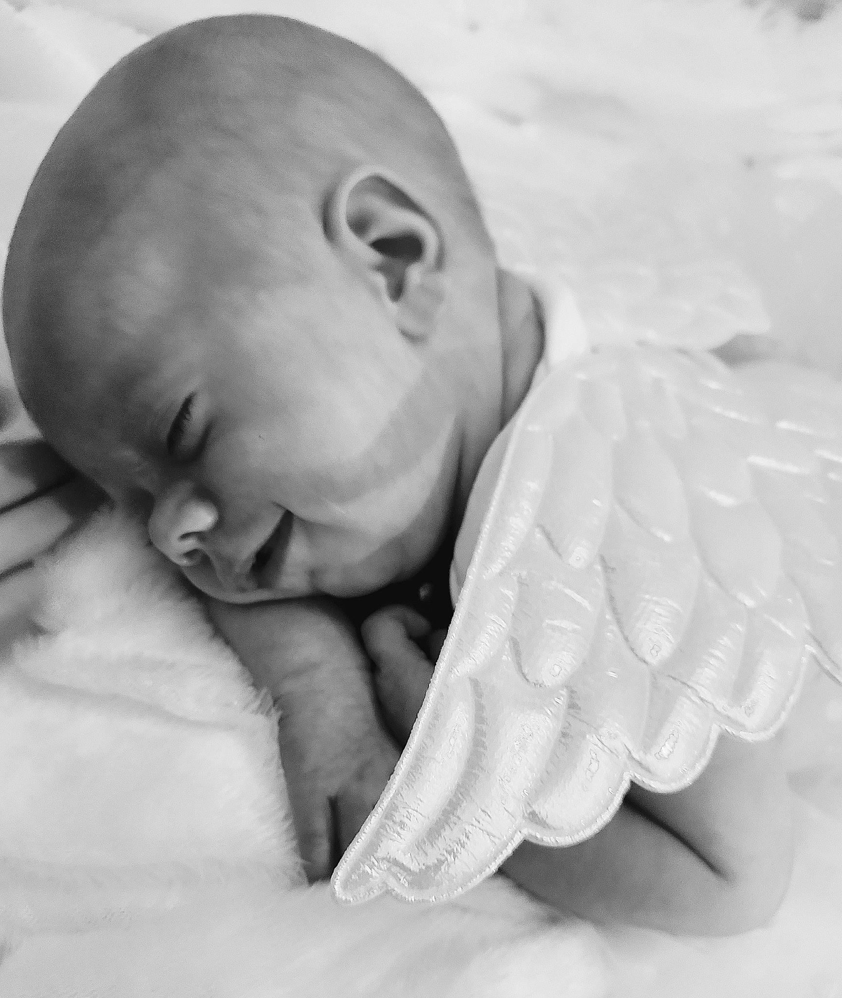 Luna joined the competition — help win amazing prizes! baby, bedtime, child, close_up, comfort, finger, gesture, happy, human_body, jaw, linens, monochrome, monochrome_photography, mouth, person, portrait_photography, sitting, still_life_photography, thumb, toddler